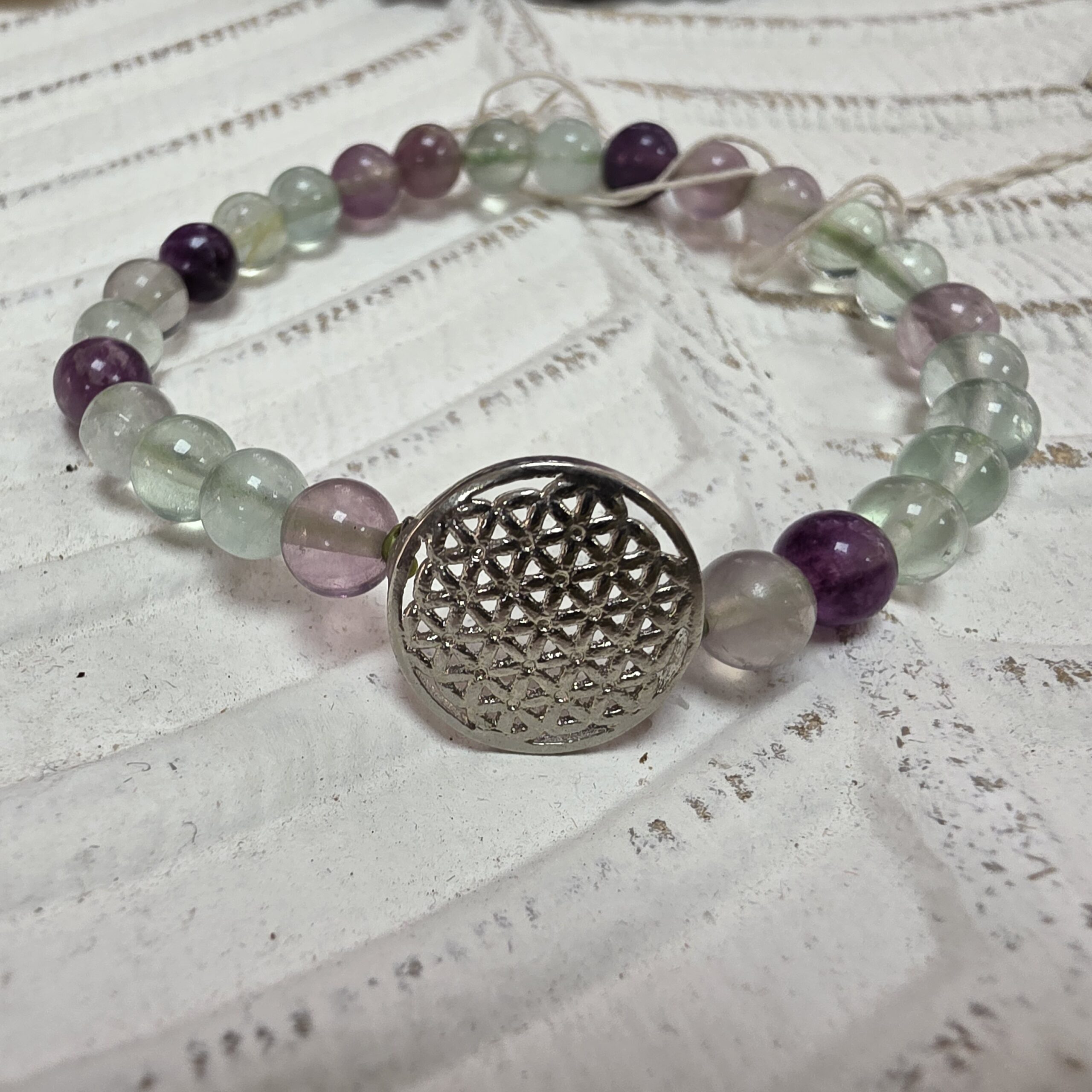 Pulseira de Fluorite com Flor da Vida