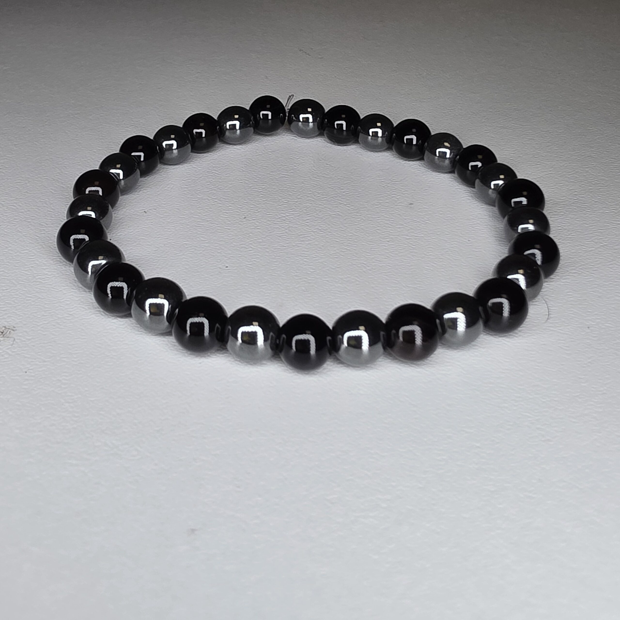 Pulseira Hematite e Onix 6mm - artesanal